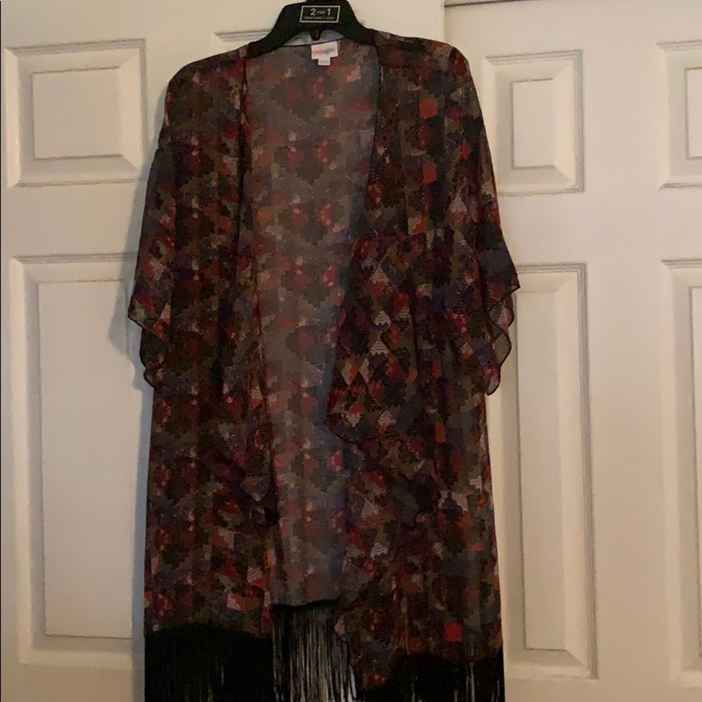 Layering piece. So cute over a bathing suit